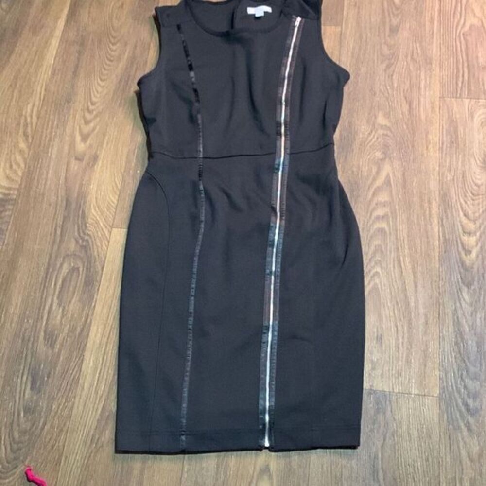 New York & company black sleeveless dress. Zip down front. Fitted party work dre
